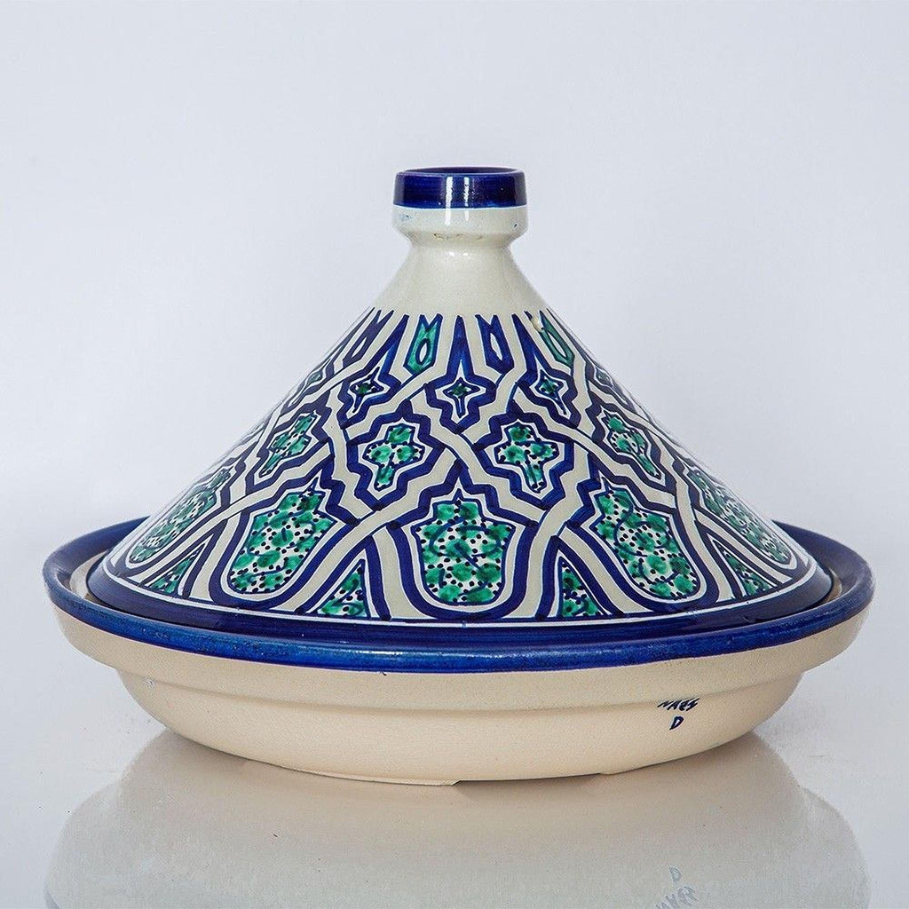 A decorative ceramic pot with a blue and white patterned design, featuring a pointed lid and a beige body.