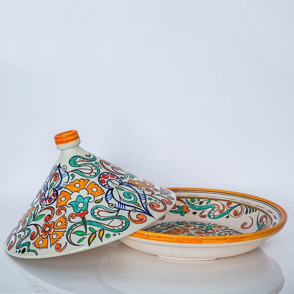 a white ceramic bowl with a colorful, intricately painted lid and a matching bowl with a lid, both adorned with vibrant floral and abstract designs.