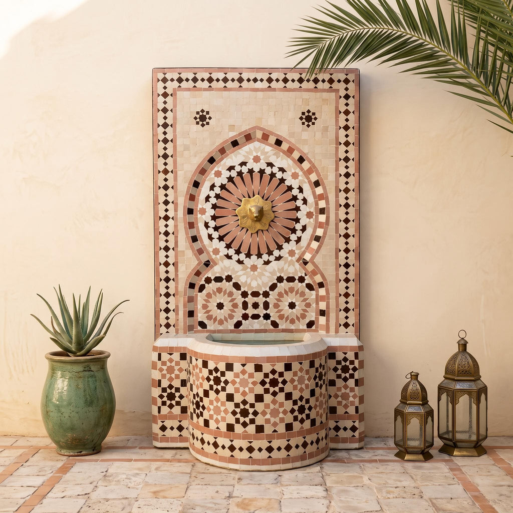 a decorative mosaic fountain with a golden faucet, surrounded by potted plants and lanterns, creating a serene and inviting atmosphere.
