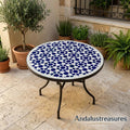 May include: Round outdoor table with a mosaic tile top featuring a blue and white star pattern. The table has a dark metal frame and legs. The table is approximately 24 inches in diameter.
May include: A set of three ceramic nesting bowls in shades of blue, green, and white. The bowls feature a speckled glaze and a simple, modern design. The largest bowl measures approximately 6 inches in diameter.