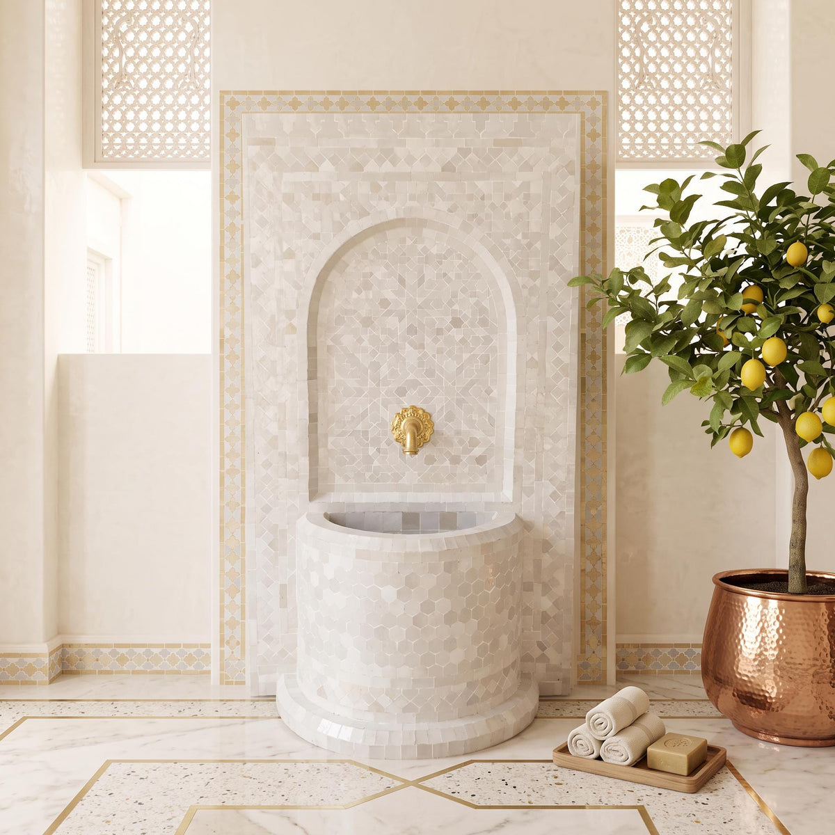a luxurious bathroom with a white marble sink, a potted lemon tree, and a decorative tile archway.