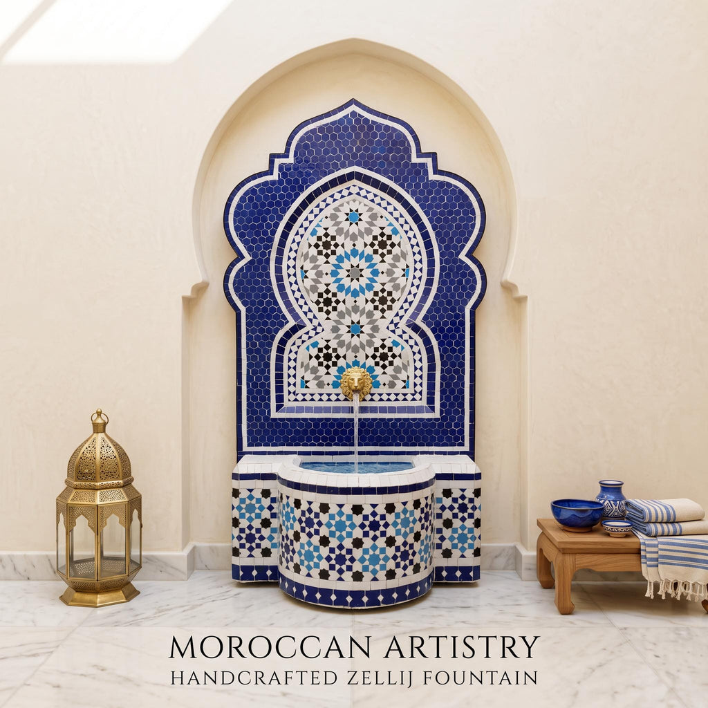 a beautifully crafted Moroccan-style fountain with intricate blue and white tile work, situated in a room with a wooden table and a gold lantern.